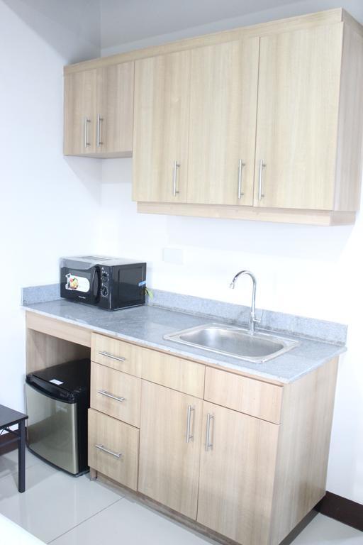 Feel Great Stay Condotels - San Marino Cebu Bagian luar foto